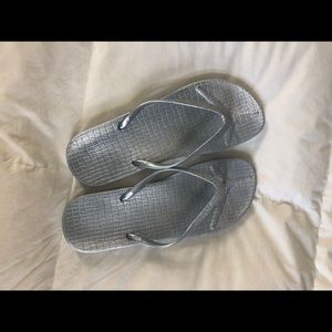 Silver metallic flip flops. Size 10